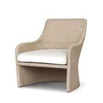 Blaire Outdoor Chair shown at a 45-degree angle highlighting sculptural woven arms