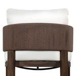 Rear close-up of chair back showing circular wood base and tightly woven brown cording