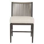 Front view of Pietra Armless Dining Chair showcasing thick beige seat cushion and vertical rope back