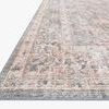 Close-up side view of Skye Grey Apricot Rug edge with detailed stitching and pile texture