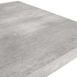 Close-up of the smooth lightweight concrete laminate surface with subtle textural details