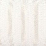 Close-up of quilted fabric texture emphasizing raised two-tone vertical stripes