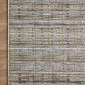Corner close-up of Soho Pebble Charcoal rug on wood floor highlighting clean edge stitching