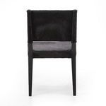 Rear view of Villa Dining Chair with black hair on hide wrap around backrest and wooden frame