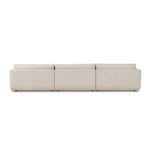 Back view of sectional showing clean lines and cushion backs aligned with base