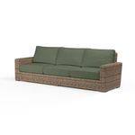 Havana outdoor sofa in aged tobacco wicker with olive green cushions and three-seat design