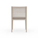 Set of Sherwood Brown chairs arranged on paved outdoor surface showing multiple seat cushion colors