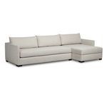 Angled view showing rounded arms and three back cushions on the Wickham sectional