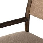 Close-up visual of armrest joint connecting fabric backrest to wooden frame