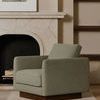 Vernon Accent Chair near fireplace in living room setting with beige walls and abstract art