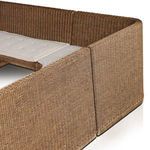 Close-up of tufted linen fabric cushion on corner section of banquette bench