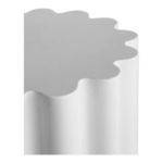 Close-up on the scalloped edges and smooth top surface of the white Taffy Accent Table