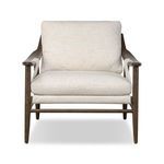 Kimmery Chair with thick-weave beige performance fabric, feather-fiber cushions, tapered oak legs, and arch stretchers