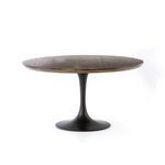 Side view of Powell Dining Table showing tulip base and round wood top in profile