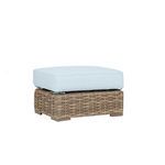 Havana Ottoman in rich aged tobacco wicker with a light blue outdoor cushion on top