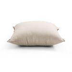 Side profile of Calvin Outdoor Pillow showing depth and shape with visible side seams
