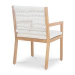 Rear angle highlighting white wicker backrest and teak wood frame without cushion