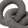 Close-up showing detailed rope texture and weave along the curve of a single link