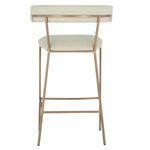 Rear view focusing on curved white faux leather backrest attached to brass frame