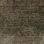 Close-up of Blanton Outdoor Rug surface emphasizing its organic broken loop pattern in olive green