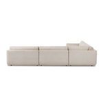 Back view of Toland sectional showing three modular pieces in cream basketweave fabric