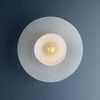 Top-down view of Netherlee Flush Mount highlighting concentric circular shapes of glass shades and exposed bulb