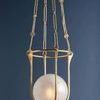 Verbank pendant with full view of suspension chains featuring circular ornaments overhead