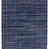Handwoven navy and cream low-profile indoor/outdoor rug with heathered linear stripe pattern