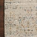 Leigh Ivory Straw Rug with distressed traditional motifs in ivory, blue, and brown tones on textured polyester pile
