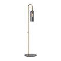 Severn Smoke Glass Floor Lamp with lit bulb seen from front at slight angle