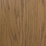 Detailed view of black metal knob hardware on glass and wood framed cabinet doors