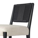 Close-up angle of backrest corner showing weaving detail and frame finish