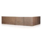 Low back angle highlighting straight rattan panels and soft cushion padding