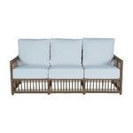 Front view of outdoor sofa with white cushions showing straight armrests and even spacing
