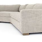 Close-up of wide armrest from a different angle revealing fabric texture and cushion height