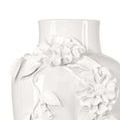 Detailed close-up of the porcelain flowers and leaves decorative elements on the vase’s shoulder