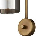 Close-up detail of the gold brushed metal dimmer switch and smoke glass edge of Severn Wall Sconce