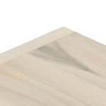 Close-up of light poplar wood lid surface, highlighting smooth grain and coloration