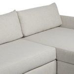 Close-up showing two seat cushions and back cushions meeting at chaise section