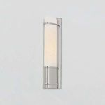 Tottenville Wall Sconce mounted on wall with soft light glow illuminating matte cloud glass shade
