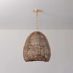 Pendant shown installed from ceiling in a room with white walls, hanging at a medium height