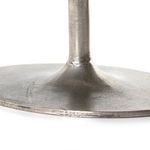 Lower angle showing polished seams and graduated form of tulip pedestal