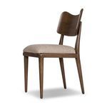 Three-quarter rear view of Marley Dining Chair showing seat cushion and curved backrest angle