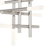 Detailed view of multiple chrome arms with frosted acrylic diffusers from side angle