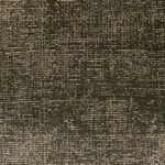 Close-up detail of the heathered looped texture and organic pattern of Blanton Outdoor Rug