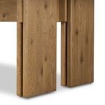 Underneath view of table focusing on leg junction and support beam placement