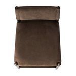 Top-down view of seat and backrest upholstery showing smooth leather surface and rounded wooden posts