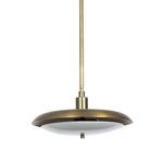Pendant light illuminated, visible through frosted glass diffuser with warm light glow