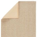 Corner view with rug corner flipped to reveal soft beige woven backing