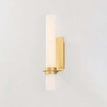 Groveland Station Wall Sconce illuminated, showing soft warm light through matte cloud glass